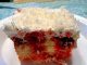 RASPBERRY ZINGER POKE CAKE